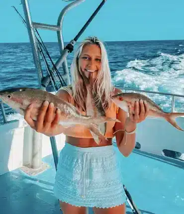 Woman catch a fish in Islamorada